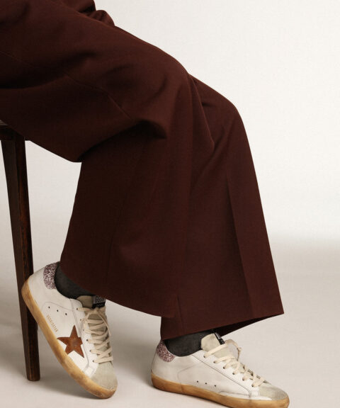 Super-Star with a tan star and pink glitter heel tab