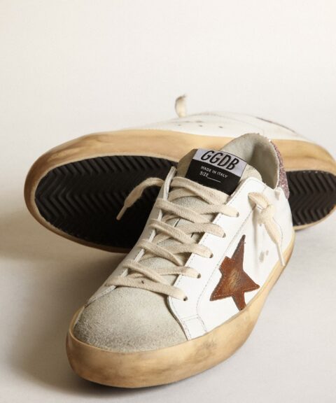Super-Star with a tan star and pink glitter heel tab